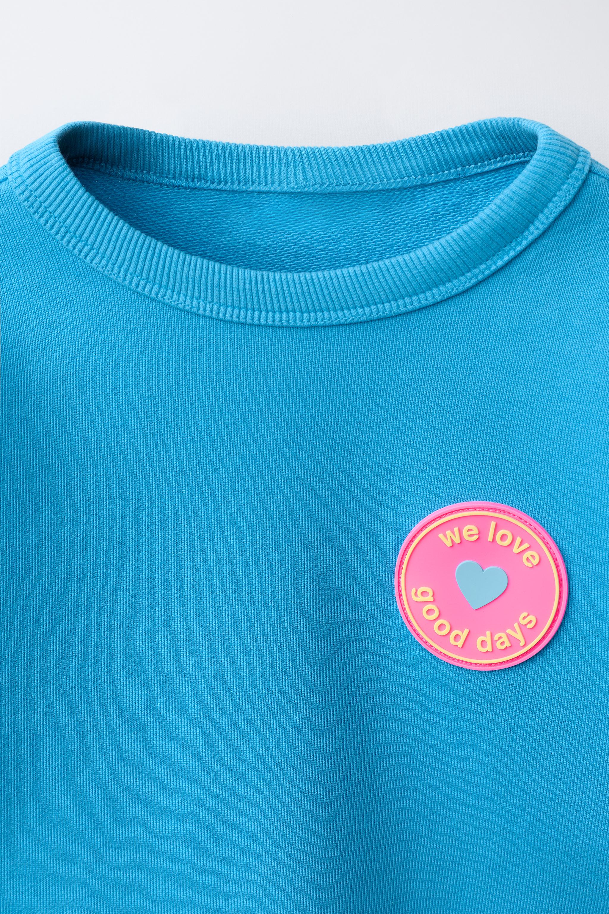 ENSEMBLE SWEAT ET BERMUDA À FLEUR GOMMÉE